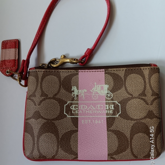 Coach Handbags - Coach wristlet beige pink straps. Excellent condition